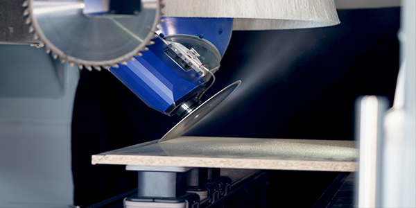 A picture of a leitz katana saw blade in use on a CNC machining centre to cut mitre joints