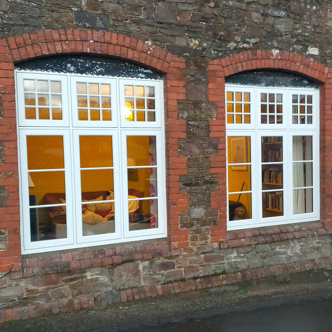 A set of Lignum timber windows manufactured by JF Joinery