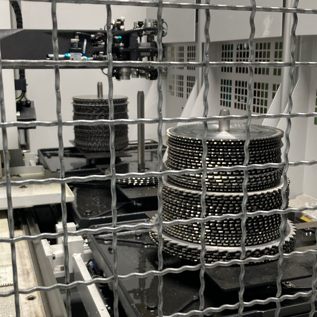 A saw sharpening robot sharpening carbide saw blades