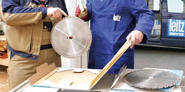 An Image of Leitz service staff picking up saw blades for a professional saw blade sharpening service.