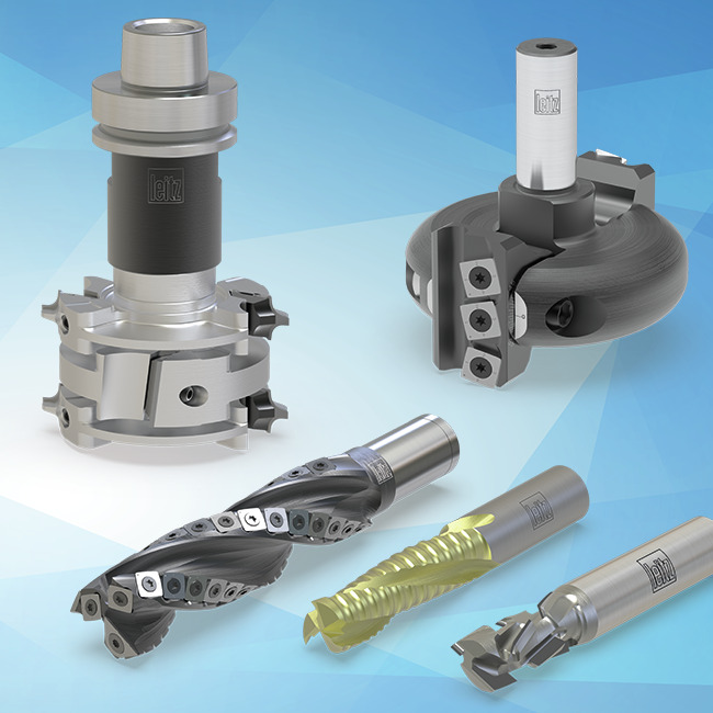 A group of shank tools including carbide router cutters, router cutters and rebate heads on a light blue background
