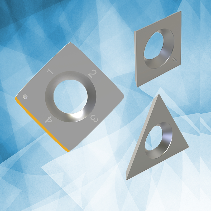 A Selection of carbide inserts and spurs featuring a square and triangular spur design on a light blue background